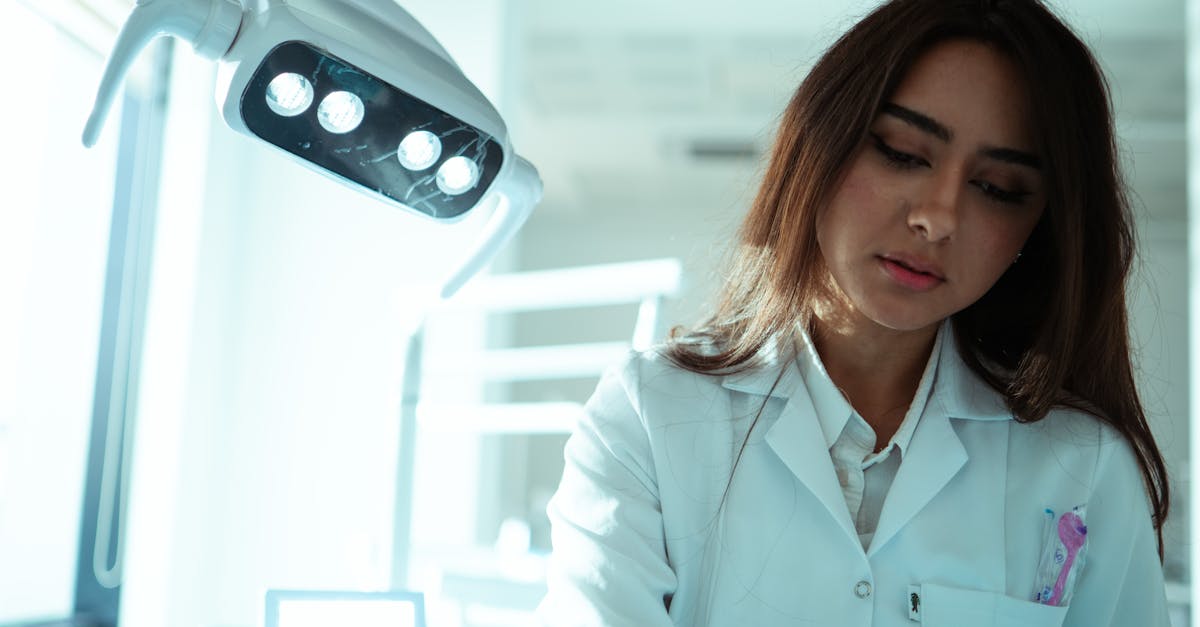 female dentist in a modern dental clinic with equipment focused on patient care